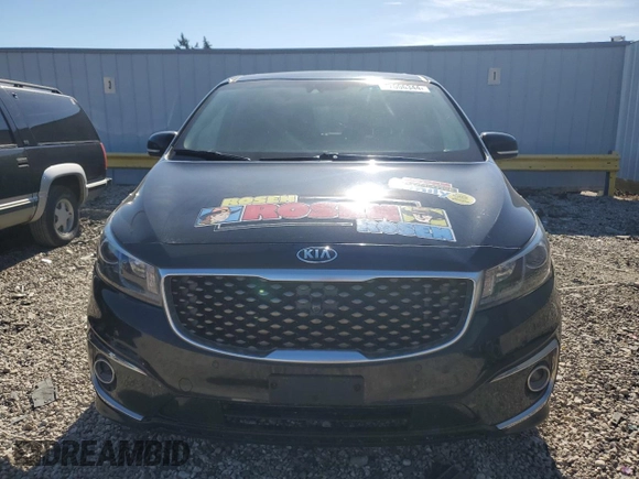 2017 Kia Sedona SX-L with VIN KNDME5C10H6278975, listed as a Copart auction lot 77006344 with 200,874 mi miles and Non Repairable. Bid and sale history available at carsss.com. Image 5.