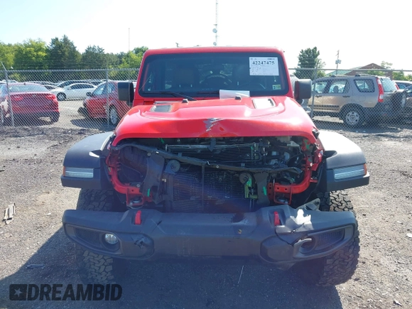 2021 Jeep Wrangler Unlimited Rubicon with VIN 1C4HJXFG2MW575541, listed as a IAAI auction lot 42247475 with 92,353 mi miles and . Bid and sale history available at DreamBid. Image 13.