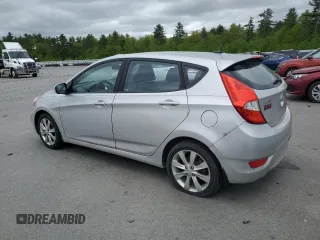 2013 Hyundai Accent SE z VIN KMHCU5AE2DU118005, wystawiony jako Copart lot #57415595 z przebiegiem 123 865 mil mil oraz Czysty tytuł • Clean title. Historia ofert i sprzedaży dostępna na DreamBid. Obrazek 2.