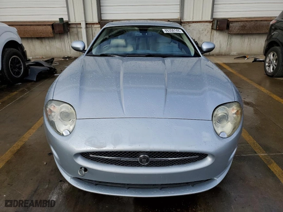 2007 Jaguar XK with VIN SAJWA43B775B07074, listed as a Copart auction lot 86350144 with 117,915 mi miles and Salvage Title. Bid and sale history available at carsss.com. Image 5.