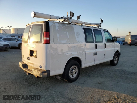 2014 Chevrolet Express Cargo z VIN 1GCWGFCB0E1122350, wystawiony jako Copart lot #58278045 z przebiegiem 99 593 mil mil oraz Czysty tytuł • Clean title. Historia ofert i sprzedaży dostępna na DreamBid. Obrazek 3.