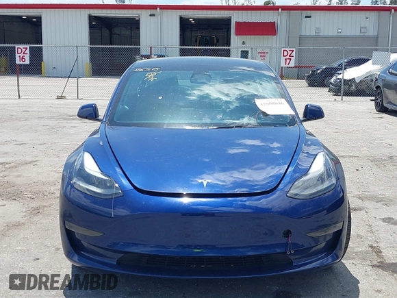 2023 Tesla Model 3 with VIN 5YJ3E1EA0PF658080, listed as a IAAI auction lot 42008846 with 32,301 mi miles and . Bid and sale history available at carsss.com. Image 13.