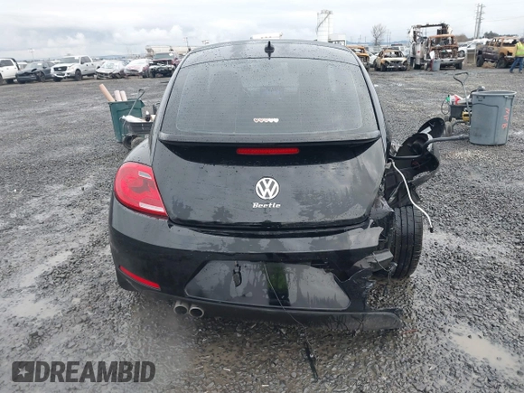 2014 Volkswagen Beetle 2.5L w/Sun with VIN 3VWJP7AT3EM608906, listed as a IAAI auction lot 41501830 with 42,804 mi miles and . Bid and sale history available at DreamBid. Image 16.