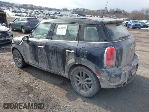 2013 MINI Countryman S ALL4 with VIN WMWZC5C58DWP30936, listed as a IAAI auction lot 41314553 with 128,405 mi miles and . Bid and sale history available at DreamBid. Image 3.
