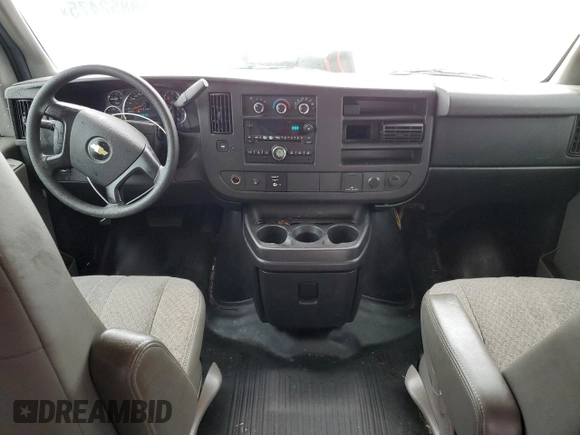2015 Chevrolet Express Cargo z VIN 1GCZGUCG4F1264179, wystawiony jako Copart lot #58852475 z przebiegiem 294 776 mil mil oraz Czysty tytuł • Clean title. Historia ofert i sprzedaży dostępna na DreamBid. Obrazek 8.