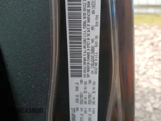2015 Jeep Wrangler Unlimited Freedom with VIN 1C4BJWDG4FL568601, listed as a Copart auction lot 64041415 with 128,874 mi miles and Salvage title. Bid and sale history available at DreamBid. Image 13.