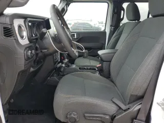 2025 Jeep Wrangler Sahara with VIN 1C4PJXEN1SW528297, listed as a Copart auction lot 55950005 with 7,167 mi miles and Clean title. Bid and sale history available at DreamBid. Image 7.