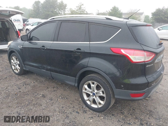 2014 Ford Escape Titanium with VIN 1FMCU9J90EUC24898, listed as a IAAI auction lot 42166523 with 152,464 mi miles and . Bid and sale history available at DreamBid. Image 3.