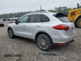 2014 Porsche Cayenne S with VIN WP1AB2A25ELA57213, listed as a Copart auction lot 57843255 with 165,501 mi miles and Salvage title. Bid and sale history available at DreamBid. Image 2.