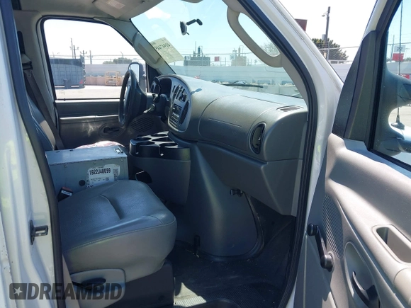 2006 Ford Econoline Cargo with VIN 1FTNE24L66HA64111, listed as a IAAI auction lot 41947445 with 205,025 mi miles and . Bid and sale history available at DreamBid. Image 5.