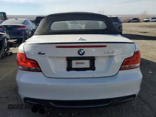 2013 BMW 1 Series 135i with VIN WBAUN7C57DVM27118, listed as a Copart auction lot 86964304 with 57,182 mi miles and Salvage Title. Bid and sale history available at carsss.com. Image 6.