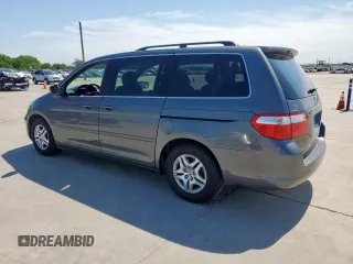 2007 Honda Odyssey EX with VIN 5FNRL38437B068697, listed as a Copart auction lot 60875505 with 211,688 mi miles and Salvage title. Bid and sale history available at DreamBid. Image 2.