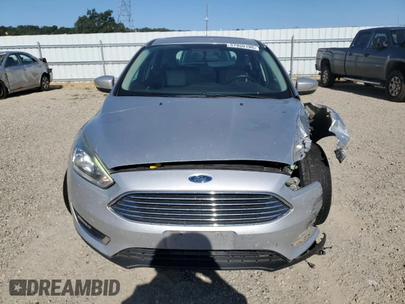 2017 Ford Focus Titanium with VIN 1FADP3N21HL279810, listed as a Copart auction lot 57950195 with 121,139 mi miles and Salvage title. Bid and sale history available at DreamBid. Image 5.
