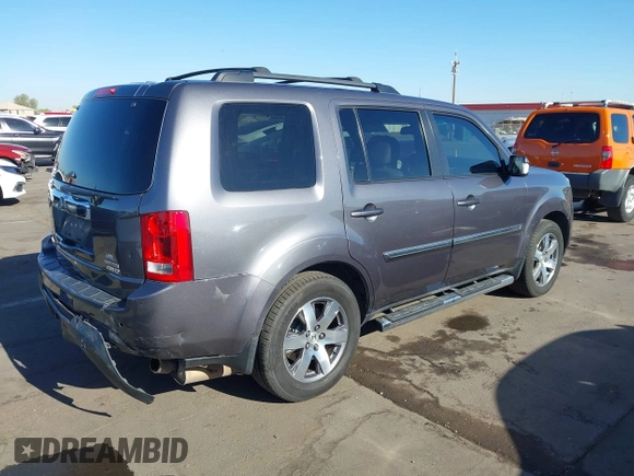 2014 Honda Pilot Touring z VIN 5FNYF4H90EB033259, wystawiony jako IAAI lot #42287774 z przebiegiem 115 416 mil mil oraz . Historia ofert i sprzedaży dostępna na DreamBid. Obrazek 4.