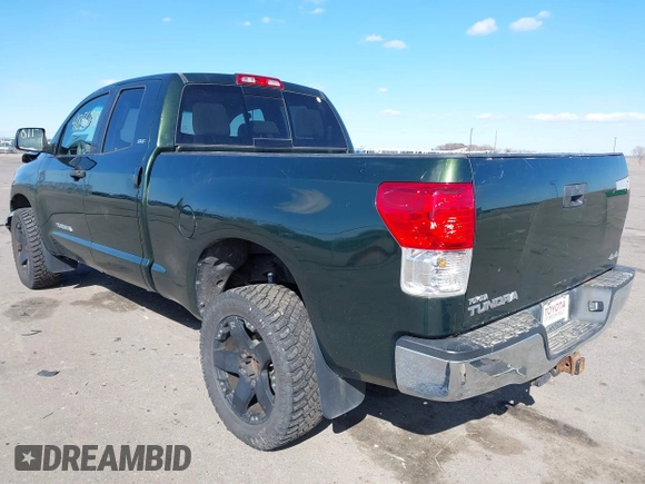 2011 Toyota Tundra 4WD Truck with VIN 5TFUM5F18BX020803, listed as a IAAI auction lot 41856078 with 110,119 mi miles. Bid and sale history available at carsss.com. Image 3.