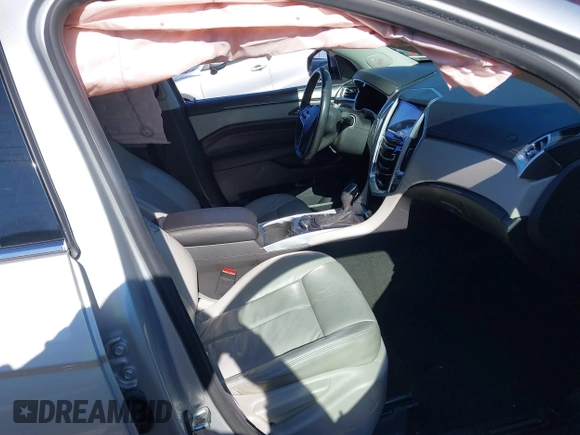 2015 Cadillac SRX with VIN 3GYFNAE39FS591106, listed as a IAAI auction lot 41539502 with 179,182 mi miles and . Bid and sale history available at DreamBid. Image 5.