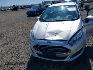2017 Ford Fiesta S z VIN 3FADP4AJ4HM132253, wystawiony jako IAAI lot #42020157 z przebiegiem 70 942 mil mil oraz . Historia ofert i sprzedaży dostępna na DreamBid. Obrazek 6.
