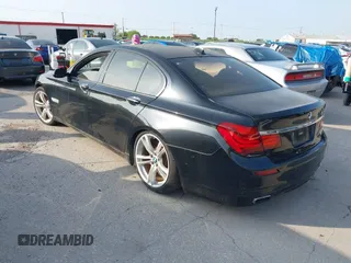 2013 BMW 7 Series 750i with VIN WBAYA8C59DC996552, listed as a IAAI auction lot 41921201 with 99,188 mi miles and . Bid and sale history available at DreamBid. Image 3.