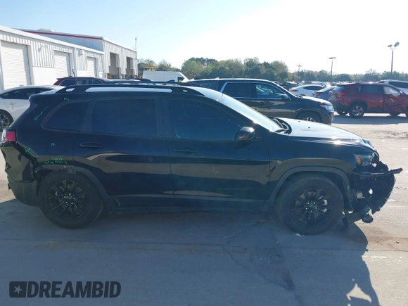 2023 Jeep Cherokee Altitude Lux with VIN 1C4PJMMB9PD100437, listed as a IAAI auction lot 41682945 with 47,428 mi miles. Bid and sale history available at carsss.com. Image 13.
