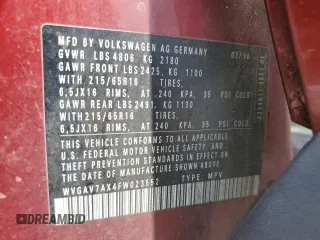 2015 Volkswagen Tiguan S z VIN WVGAV7AX4FW023552, wystawiony jako Copart lot #55904805 z przebiegiem 213 510 mil mil oraz Czysty tytuł • Clean title. Historia ofert i sprzedaży dostępna na DreamBid. Obrazek 14.