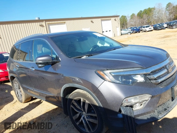 2017 Honda Pilot Touring with VIN 5FNYF5H92HB038893, listed as a IAAI auction lot 41639555 with 100,354 mi miles. Bid and sale history available at carsss.com. Image 13.