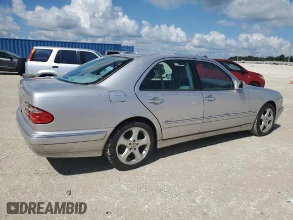 2002 Mercedes-Benz E-Class with VIN WDBJF65J02B495961, listed as a Copart auction lot 73844554 with 99,380 mi miles and Salvage Title. Bid and sale history available at carsss.com. Image 3.