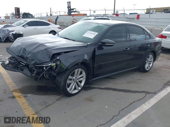 2019 Volkswagen Passat 2.0T Wolfsburg Edition with VIN 1VWLA7A34KC012887, listed as a IAAI auction lot 41792604 with 70,237 mi miles. Bid and sale history available at carsss.com. Image 18.