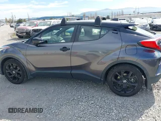 2021 Toyota C-HR LE with VIN JTNKHMBX1M1120212, listed as a IAAI auction lot 41975849 with 62,228 mi miles. Bid and sale history available at carsss.com. Image 15.