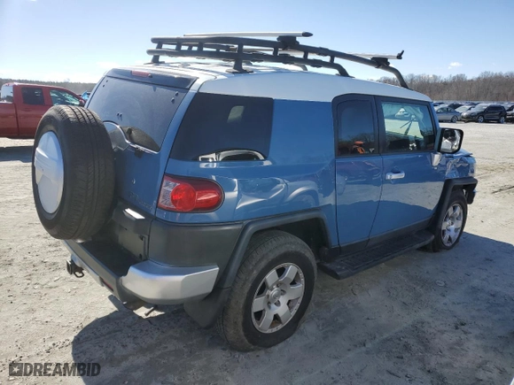 2011 Toyota FJ Cruiser with VIN JTEBU4BF1BK102982, listed as a Copart auction lot 47958985 with 215,418 mi miles and Salvage Title. Bid and sale history available at carsss.com. Image 3.