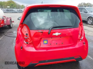 2014 Chevrolet Spark LS z VIN KL8CB6S98EC548672, wystawiony jako IAAI lot #41953786 z przebiegiem 114 330 mil mil oraz . Historia ofert i sprzedaży dostępna na DreamBid. Obrazek 6.