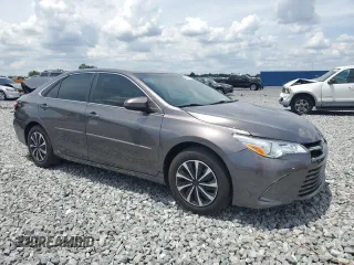 2015 Toyota Camry XLE with VIN 4T4BF1FK5FR461977, listed as a Copart auction lot 55680985 with 104,588 mi miles and Salvage Title. Bid and sale history available at DreamBid. Image 4.