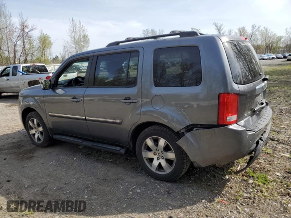 2012 Honda Pilot Touring with VIN 5FNYF4H92CB030828, listed as a Copart auction lot 54971505 with 215,219 mi miles and Salvage Title. Bid and sale history available at carsss.com. Image 2.