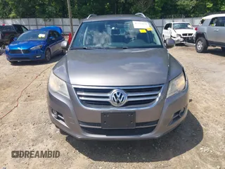 2011 Volkswagen Tiguan SEL z VIN WVGBV7AX5BW512203, wystawiony jako IAAI lot #42273838 z przebiegiem 157 072 mil mil oraz . Historia ofert i sprzedaży dostępna na DreamBid. Obrazek 12.