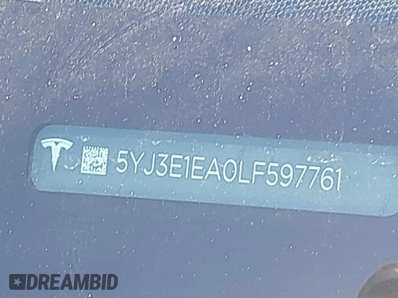 2020 Tesla Model 3 Standard Range Plus with VIN 5YJ3E1EA0LF597761, listed as a IAAI auction lot 41773918 with 89,957 mi miles. Bid and sale history available at carsss.com. Image 18.