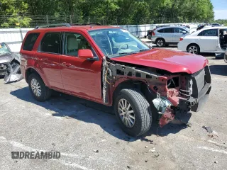 2011 Mercury Mariner Premier with VIN 4M2CN8HG0BKJ08313, listed as a Copart auction lot 57630215 with 188,818 mi miles and Salvage title. Bid and sale history available at DreamBid. Image 4.