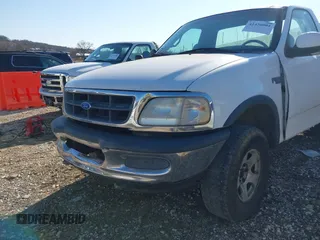 1997 Ford F-150 with VIN 1FTDF1825VNC38853, listed as a IAAI auction lot 41436001 with Not provided miles and . Bid and sale history available at DreamBid. Image 6.