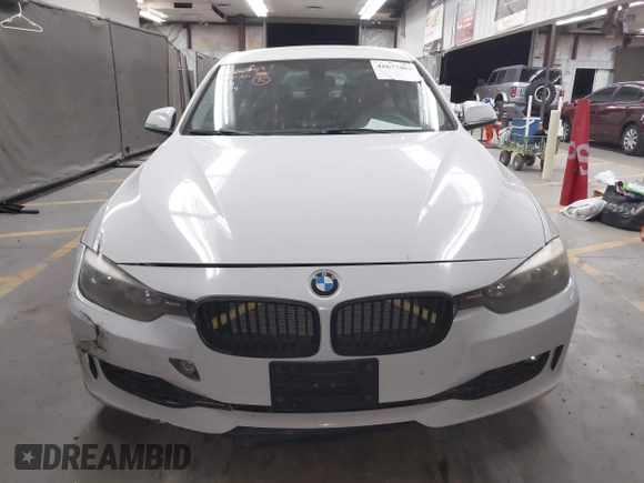 2013 BMW 3 Series 328i z VIN WBA3A5G5XDNP25779, wystawiony jako IAAI lot #42677403 z przebiegiem 93 020 mil mil oraz . Historia ofert i sprzedaży dostępna na DreamBid. Obrazek 12.
