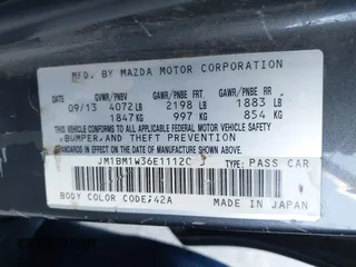 2014 Mazda 3 S Grand Touring with VIN JM1BM1W36E1112033, listed as a IAAI auction lot 41412655 with 115,050 mi miles and . Bid and sale history available at DreamBid. Image 9.