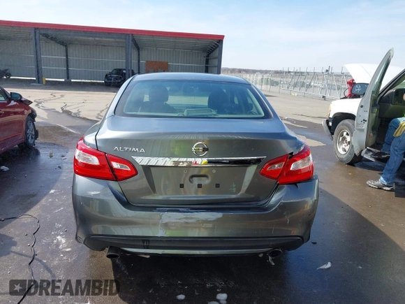 2016 Nissan Altima SV with VIN 1N4AL3AP5GC166005, listed as a IAAI auction lot 41795548 with 111,942 mi miles and . Bid and sale history available at DreamBid. Image 16.