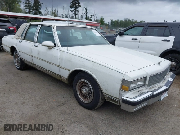1990 Chevrolet Caprice z VIN 1G1BU54E9LA105479, wystawiony jako IAAI lot #42277687 z przebiegiem 30 947 mil mil oraz . Historia ofert i sprzedaży dostępna na DreamBid. Obrazek 1.