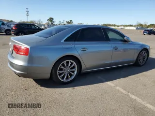 2013 Audi A8 L 3.0L with VIN WAURGAFDXDN029613, listed as a Copart auction lot 54912115 with 105,940 mi miles and Clean Title. Bid and sale history available at carsss.com. Image 3.