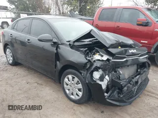 2023 Kia Rio S with VIN 3KPA24AD8PE598217, listed as a IAAI auction lot 41437823 with 33,002 mi miles. Bid and sale history available at carsss.com. Image 1.
