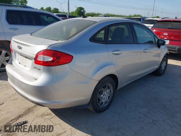 2012 Ford Fiesta S with VIN 3FADP4AJ5CM194589, listed as a IAAI auction lot 41984330 with 135,103 mi miles and . Bid and sale history available at DreamBid. Image 4.