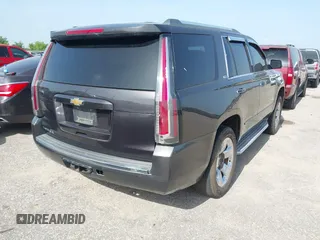 2015 Chevrolet Tahoe LTZ with VIN 1GNSCCKC2FR170090, listed as a IAAI auction lot 42616452 with 249,940 mi miles and . Bid and sale history available at DreamBid. Image 4.