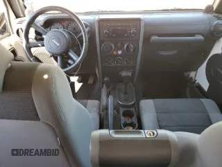 2007 Jeep Wrangler X with VIN 1J4FA24197L169328, listed as a Copart auction lot 46896325 with 149,516 mi miles and Salvage Title. Bid and sale history available at carsss.com. Image 8.