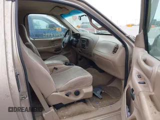 1997 Ford F-150 with VIN 2FTEX17L2VCA10536, listed as a IAAI auction lot 41917990 with 296,879 mi miles and . Bid and sale history available at DreamBid. Image 5.
