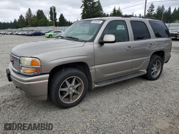 2002 GMC Yukon Denali z VIN 1GKEK63U82J224913, wystawiony jako Copart lot #60664885 z przebiegiem 208 794 mil mil oraz Szkoda całkowita • Salvage title. Historia ofert i sprzedaży dostępna na DreamBid. Obrazek 1.
