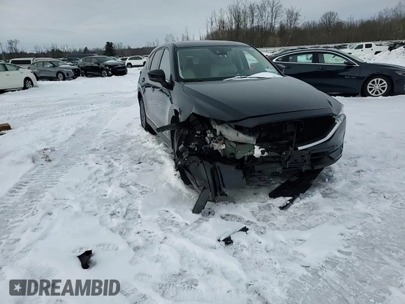 2019 Mazda CX-5 Touring with VIN JM3KFBCM0K0607933, listed as a Copart auction lot 46260815 with 64,349 mi miles and Salvage Title. Bid and sale history available at carsss.com. Image 12.