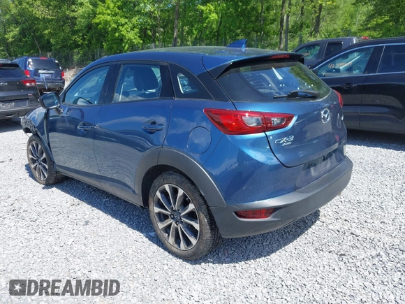 2019 Mazda CX-3 Touring z VIN JM1DKFC72K1459583, wystawiony jako IAAI lot #42380694 z przebiegiem 13 846 mil mil oraz . Historia ofert i sprzedaży dostępna na DreamBid. Obrazek 3.