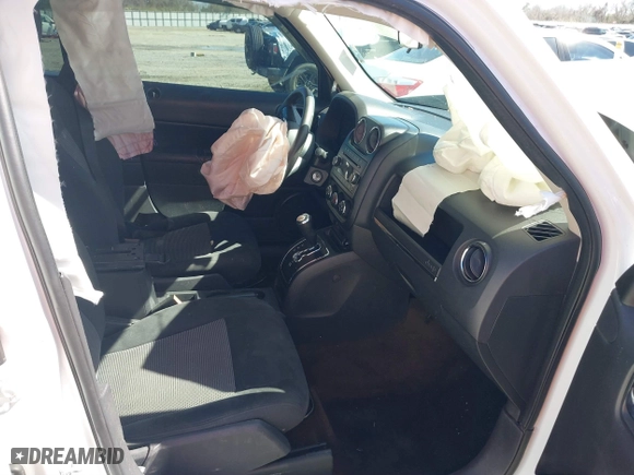 2014 Jeep Patriot Sport with VIN 1C4NJPBA9ED889186, listed as a IAAI auction lot 41738524 with 159,755 mi miles. Bid and sale history available at carsss.com. Image 5.